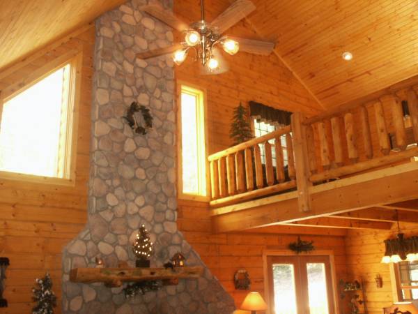 2 story open loft cabin in log and pine.jpg