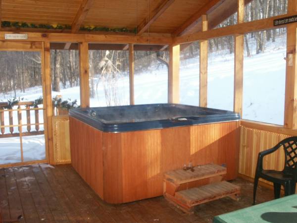 Private hot tub after a snowfall